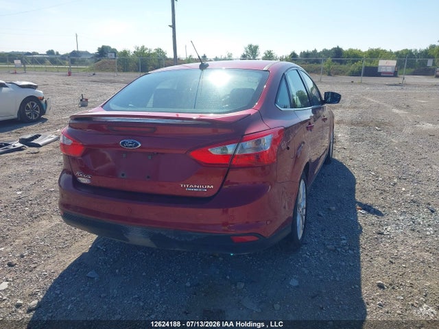 12624188 :رقم المزاد ، 1FADP3J25EL385467 vin ، 2014 Ford Focus Titanium مزاد بيع
