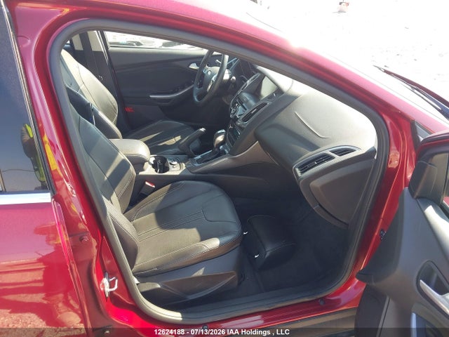 12624188 :رقم المزاد ، 1FADP3J25EL385467 vin ، 2014 Ford Focus Titanium مزاد بيع