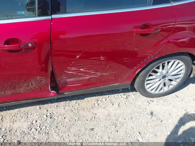 12624188 :رقم المزاد ، 1FADP3J25EL385467 vin ، 2014 Ford Focus Titanium مزاد بيع
