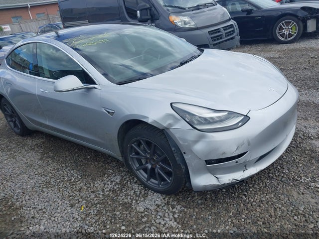 Tesla MODEL 3 2018 5YJ3E1EA9JF028999 Image 6