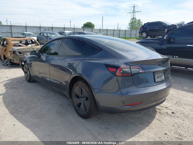 12624409 :رقم المزاد ، 5YJ3E1EB7PF688430 vin ، 2023 Tesla Model 3 Long Range مزاد بيع