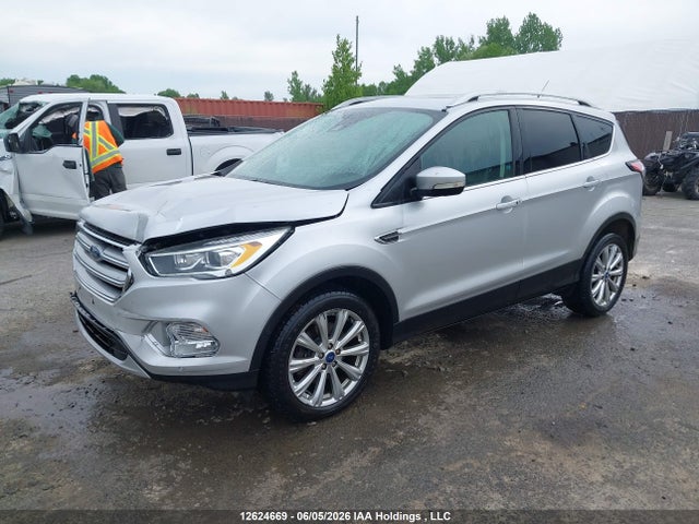 Продажа на аукционе авто 2017 Ford Escape Titanium, vin: 1FMCU9J94HUE26292, номер лота: 12624669