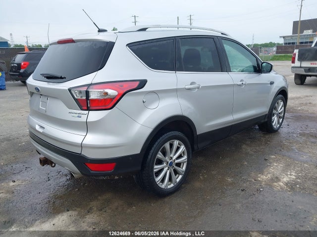 Продажа на аукционе авто 2017 Ford Escape Titanium, vin: 1FMCU9J94HUE26292, номер лота: 12624669