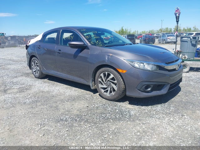 Auction sale of the 2018 Honda Civic Lx, vin: 2HGFC2F60JH024810, lot number: 12624874