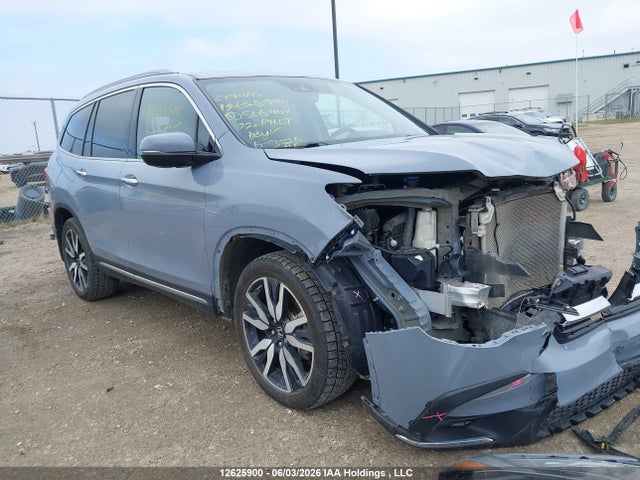 Продаж на аукціоні авто 2022 Honda Pilot Touring 8p, vin: 5FNYF6H91NB506467, номер лоту: 12625900