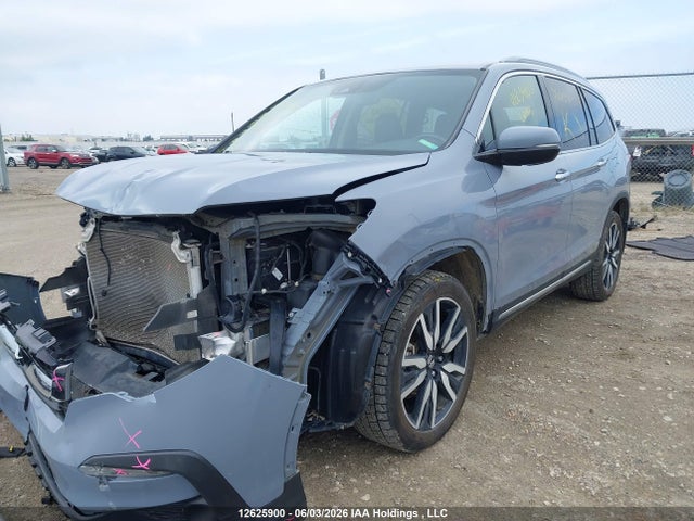 Продаж на аукціоні авто 2022 Honda Pilot Touring 8p, vin: 5FNYF6H91NB506467, номер лоту: 12625900