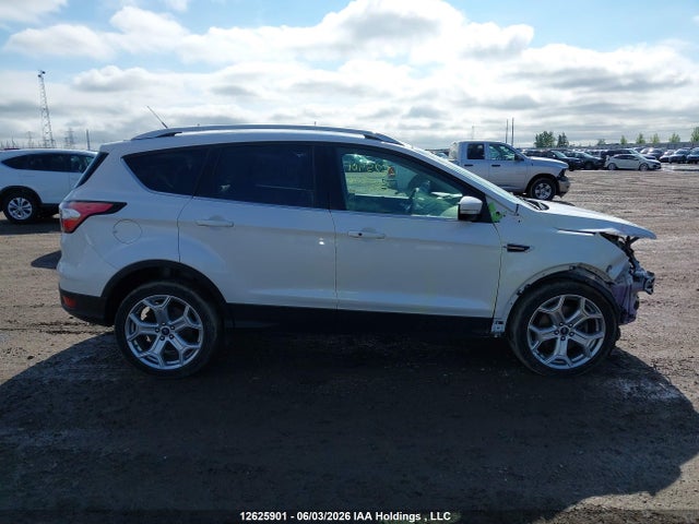 Продаж на аукціоні авто 2017 Ford Escape Titanium, vin: 1FMCU9J90HUD96935, номер лоту: 12625901