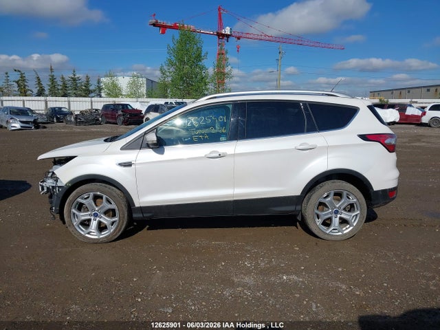 Продаж на аукціоні авто 2017 Ford Escape Titanium, vin: 1FMCU9J90HUD96935, номер лоту: 12625901
