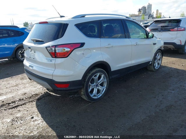 Продаж на аукціоні авто 2017 Ford Escape Titanium, vin: 1FMCU9J90HUD96935, номер лоту: 12625901