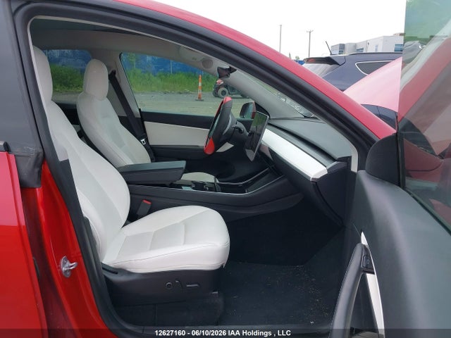 12627160 :رقم المزاد ، 5YJYGDED2MF116812 vin ، 2021 Tesla Model Y Standard Range Rear-wheel Drive مزاد بيع