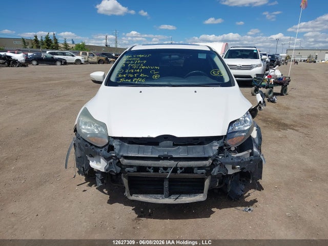 12627309 :رقم المزاد ، 1FADP3N22DL215141 vin ، 2013 Ford Focus Titanium مزاد بيع