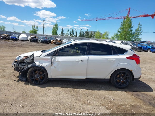 12627309 :رقم المزاد ، 1FADP3N22DL215141 vin ، 2013 Ford Focus Titanium مزاد بيع
