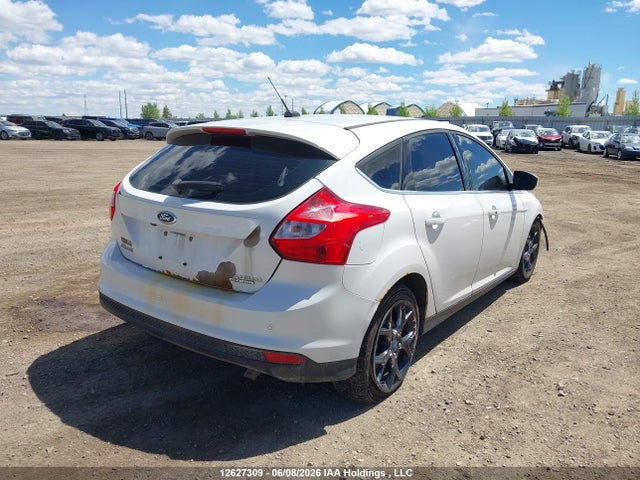 12627309 :رقم المزاد ، 1FADP3N22DL215141 vin ، 2013 Ford Focus Titanium مزاد بيع