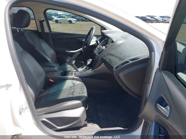 12627309 :رقم المزاد ، 1FADP3N22DL215141 vin ، 2013 Ford Focus Titanium مزاد بيع