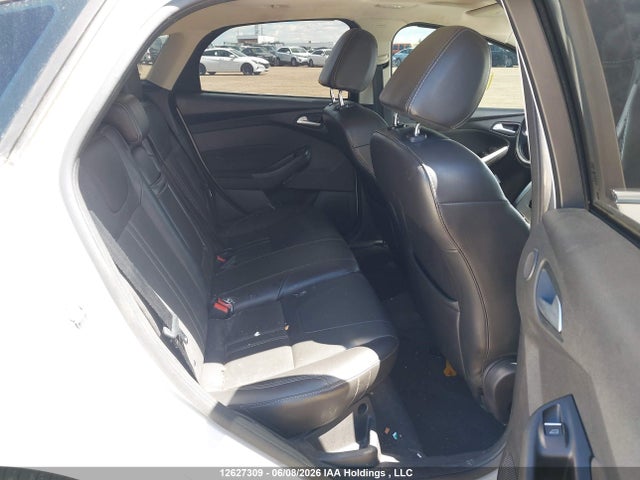 12627309 :رقم المزاد ، 1FADP3N22DL215141 vin ، 2013 Ford Focus Titanium مزاد بيع
