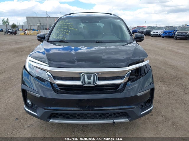 12627505 :رقم المزاد ، 5FNYF6H99LB504463 vin ، 2020 Honda Pilot Touring مزاد بيع