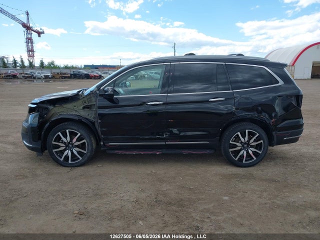 12627505 :رقم المزاد ، 5FNYF6H99LB504463 vin ، 2020 Honda Pilot Touring مزاد بيع