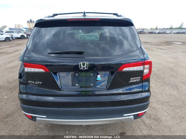 12627505 :رقم المزاد ، 5FNYF6H99LB504463 vin ، 2020 Honda Pilot Touring مزاد بيع