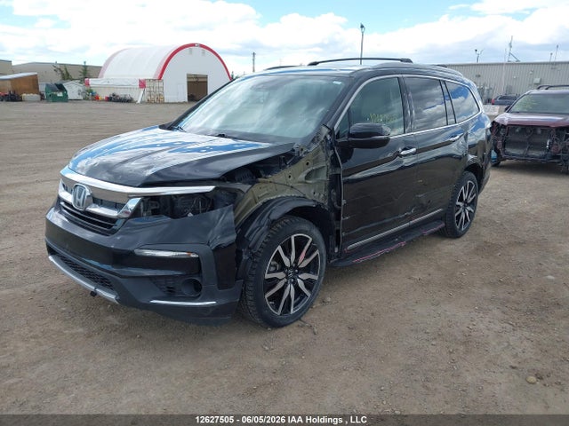 12627505 :رقم المزاد ، 5FNYF6H99LB504463 vin ، 2020 Honda Pilot Touring مزاد بيع