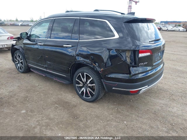 12627505 :رقم المزاد ، 5FNYF6H99LB504463 vin ، 2020 Honda Pilot Touring مزاد بيع