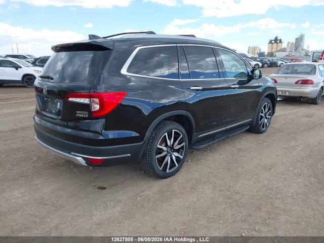 12627505 :رقم المزاد ، 5FNYF6H99LB504463 vin ، 2020 Honda Pilot Touring مزاد بيع