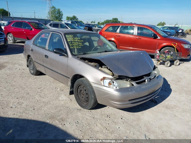 12627514 :رقم المزاد ، 2T1BR12E6XC752282 vin ، 1999 Toyota Corolla Ce/le مزاد بيع
