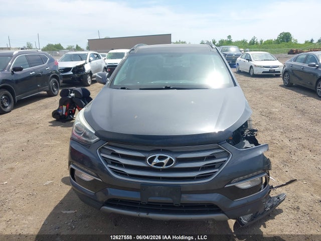12627558 :رقم المزاد ، 5XYZUDLB7HG412244 vin ، 2017 Hyundai Santa Fe Sport مزاد بيع