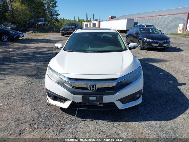 12619603 :رقم المزاد ، 2HGFC1F92GH110892 vin ، 2016 Honda Civic Touring مزاد بيع