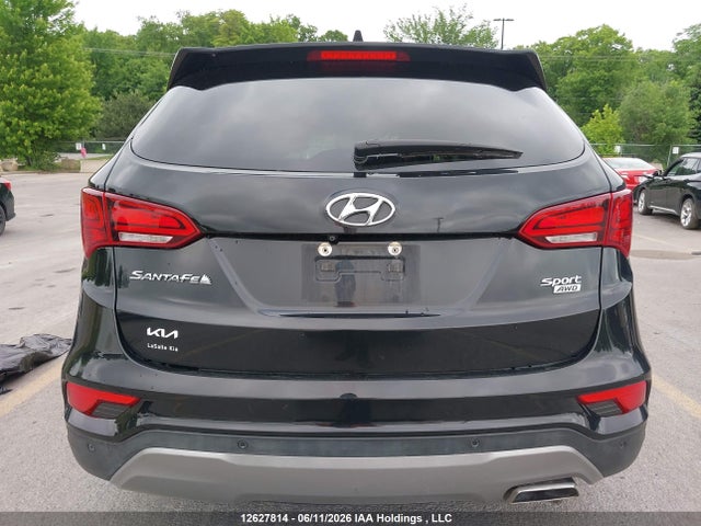 12627814 :رقم المزاد ، 5NMZUDLB1HH051289 vin ، 2017 Hyundai Santa Fe Sport 2.4 Premium مزاد بيع