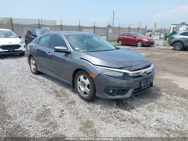 Продаж на аукціоні авто 2018 Honda Civic Touring, vin: 2HGFC1F90JH107724, номер лоту: 12628313