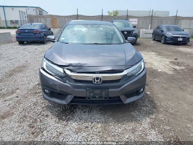 Продаж на аукціоні авто 2018 Honda Civic Touring, vin: 2HGFC1F90JH107724, номер лоту: 12628313
