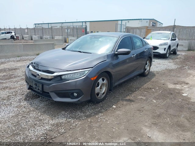 Продаж на аукціоні авто 2018 Honda Civic Touring, vin: 2HGFC1F90JH107724, номер лоту: 12628313