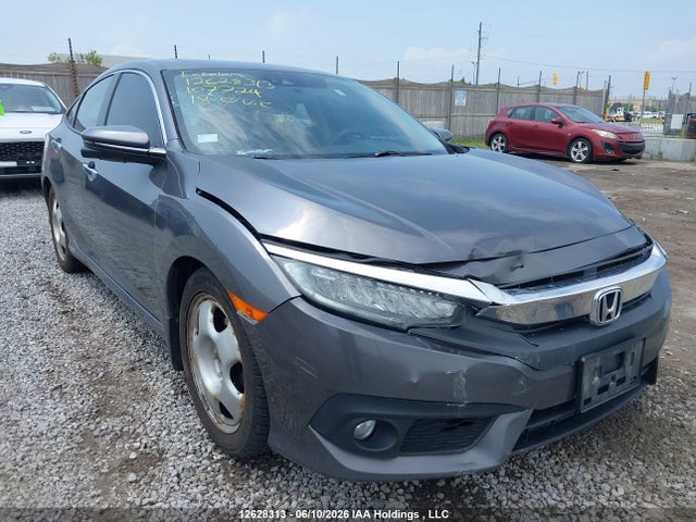 Продаж на аукціоні авто 2018 Honda Civic Touring, vin: 2HGFC1F90JH107724, номер лоту: 12628313
