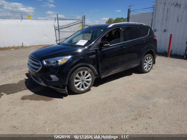 Продаж на аукціоні авто 2017 Ford Escape Titanium, vin: 1FMCU9J99HUD22736, номер лоту: 12628516