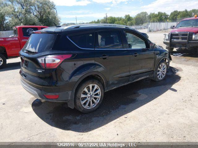 Продаж на аукціоні авто 2017 Ford Escape Titanium, vin: 1FMCU9J99HUD22736, номер лоту: 12628516