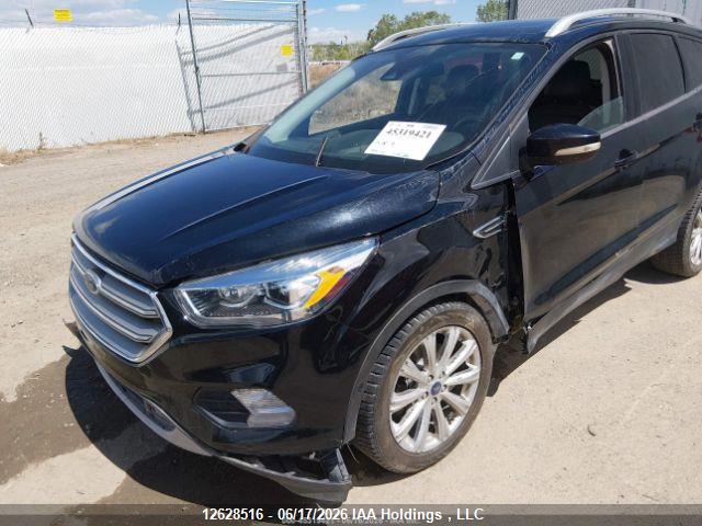 Продаж на аукціоні авто 2017 Ford Escape Titanium, vin: 1FMCU9J99HUD22736, номер лоту: 12628516