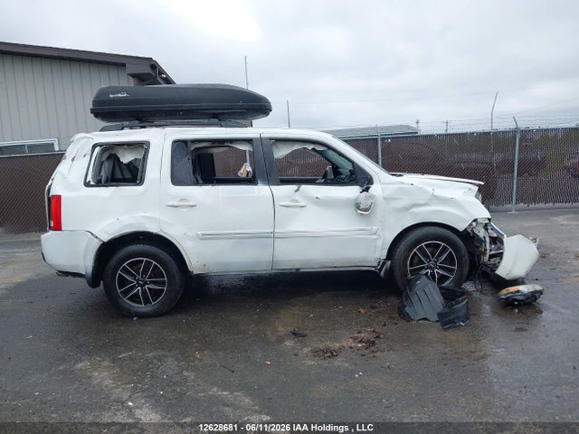12628681 :رقم المزاد ، 5FNYF4H93AB504315 vin ، 2010 Honda Pilot Touring مزاد بيع