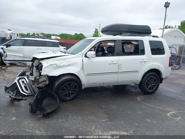 12628681 :رقم المزاد ، 5FNYF4H93AB504315 vin ، 2010 Honda Pilot Touring مزاد بيع