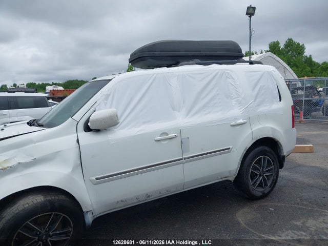 12628681 :رقم المزاد ، 5FNYF4H93AB504315 vin ، 2010 Honda Pilot Touring مزاد بيع
