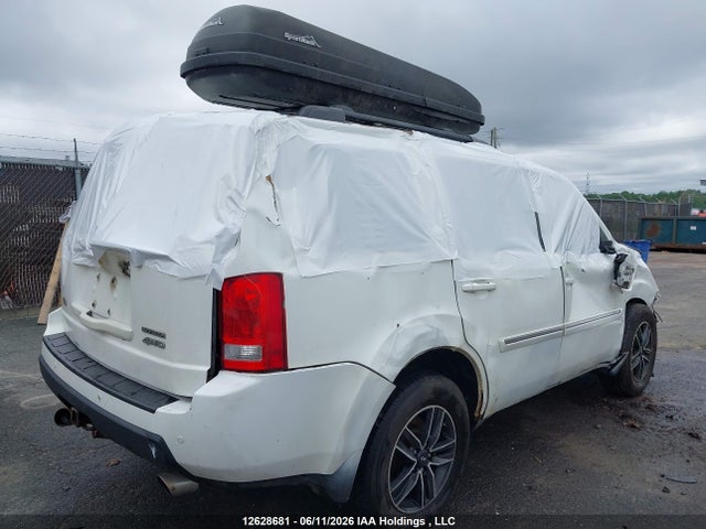 12628681 :رقم المزاد ، 5FNYF4H93AB504315 vin ، 2010 Honda Pilot Touring مزاد بيع