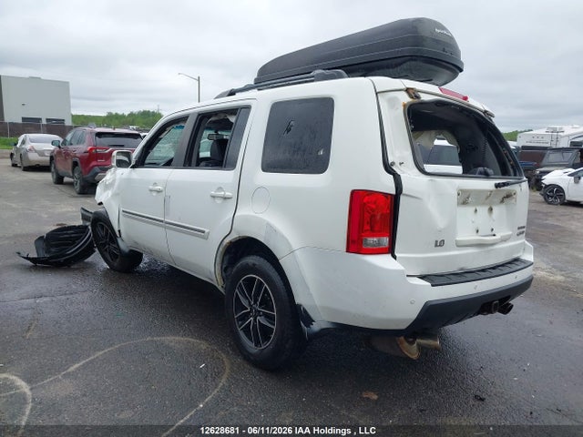 12628681 :رقم المزاد ، 5FNYF4H93AB504315 vin ، 2010 Honda Pilot Touring مزاد بيع
