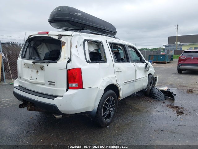 12628681 :رقم المزاد ، 5FNYF4H93AB504315 vin ، 2010 Honda Pilot Touring مزاد بيع