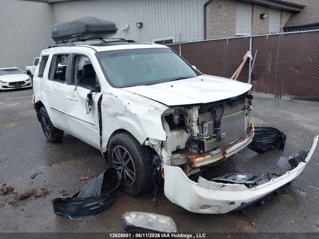 12628681 :رقم المزاد ، 5FNYF4H93AB504315 vin ، 2010 Honda Pilot Touring مزاد بيع
