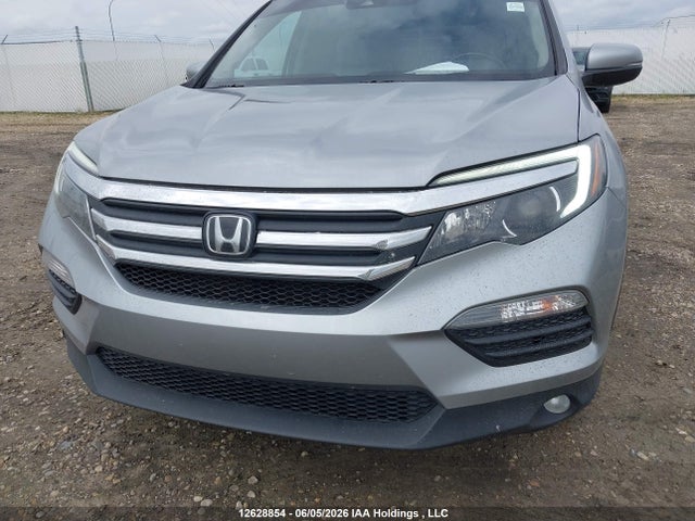 2017 Honda Pilot Exln მანქანა იყიდება აუქციონზე, vin: 5FNYF6H7XHB501917, აუქციონის ნომერი: 12628854
