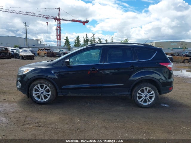 12629886 :رقم المزاد ، 1FMCU0HDXJUB65018 vin ، 2018 Ford Escape Sel مزاد بيع