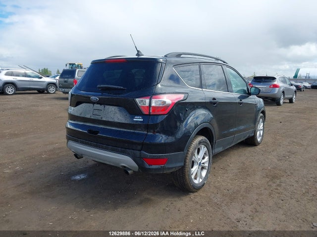 12629886 :رقم المزاد ، 1FMCU0HDXJUB65018 vin ، 2018 Ford Escape Sel مزاد بيع