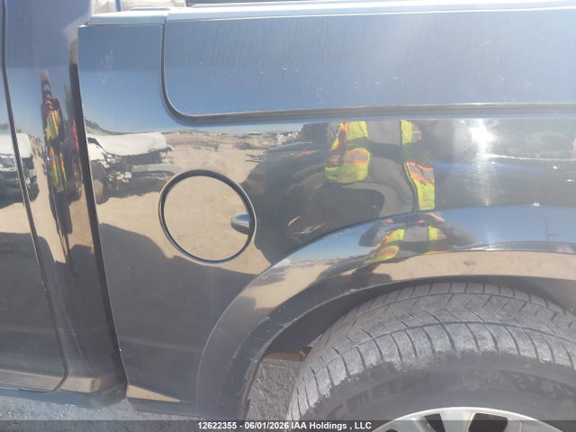 12622355 :رقم المزاد ، 1C6RR7PT9DS614939 vin ، 2013 Ram 1500 Laramie Longhorn مزاد بيع