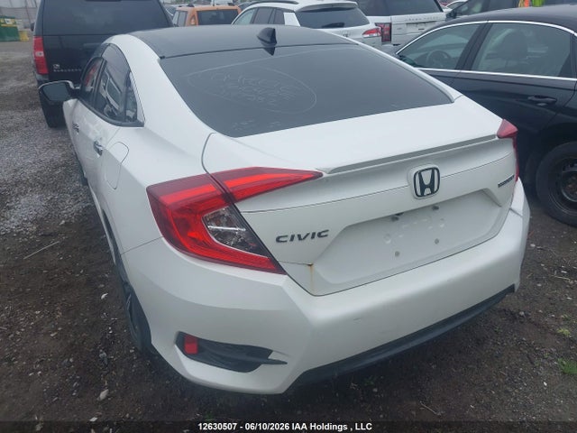 2016 Honda Civic Touring მანქანა იყიდება აუქციონზე, vin: 2HGFC1F91GH113878, აუქციონის ნომერი: 12630507