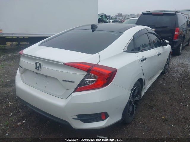 2016 Honda Civic Touring მანქანა იყიდება აუქციონზე, vin: 2HGFC1F91GH113878, აუქციონის ნომერი: 12630507