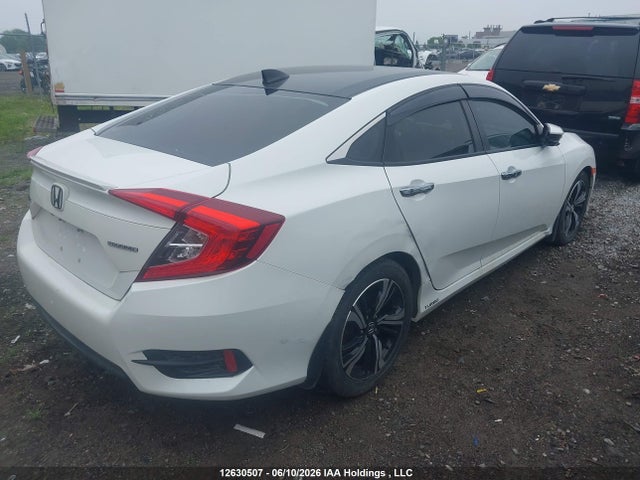 2016 Honda Civic Touring მანქანა იყიდება აუქციონზე, vin: 2HGFC1F91GH113878, აუქციონის ნომერი: 12630507